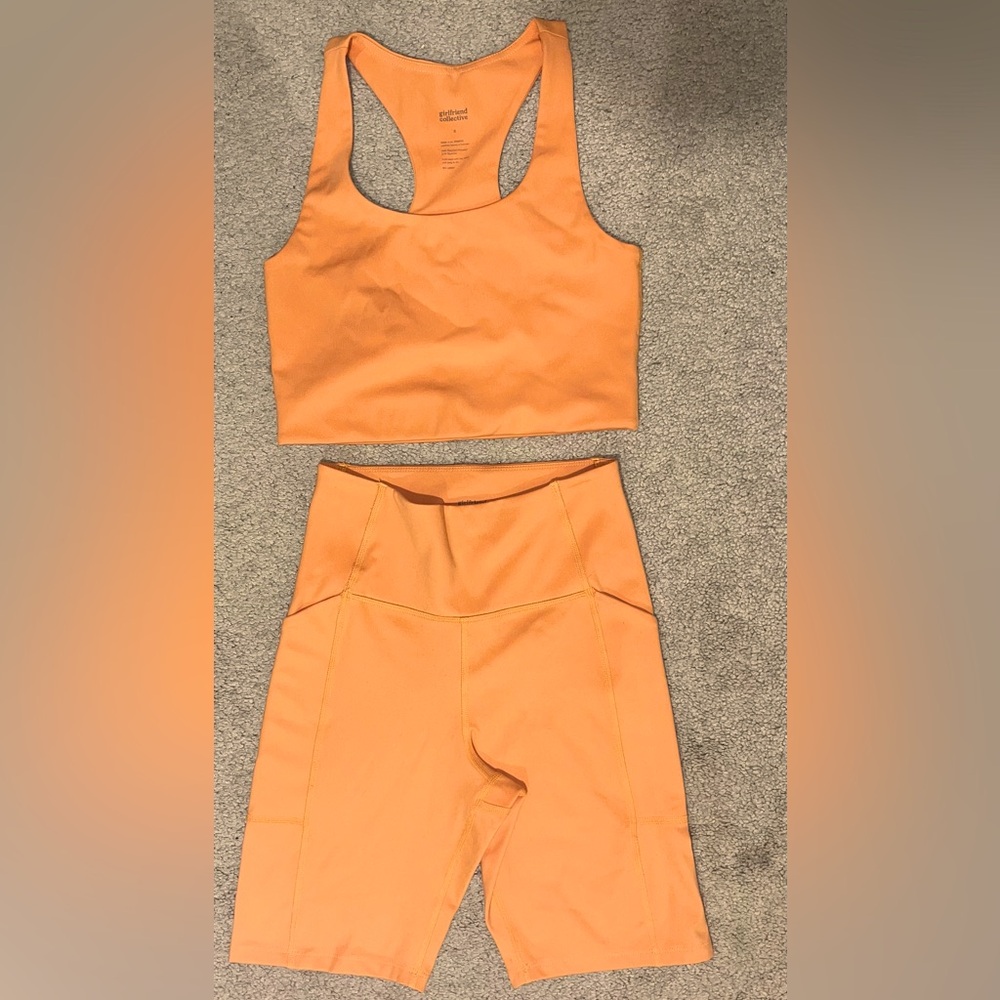 Girlfriend Collective Paloma Bra and Pocket Bike Shorts in Horizon Orange